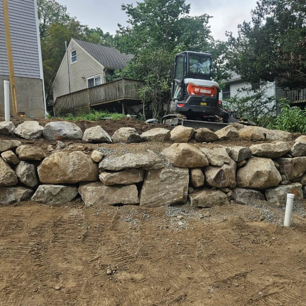 excavator-on-stones